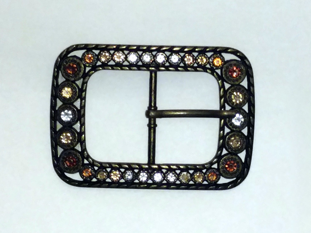 Jeweled, metal belt buckle